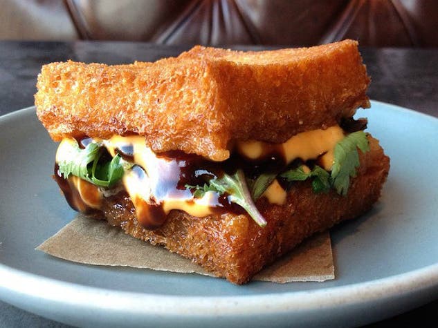 Shrimp toast sandwich at Son of a Gun | Photo: @jonandvinnydelivery, Instagram