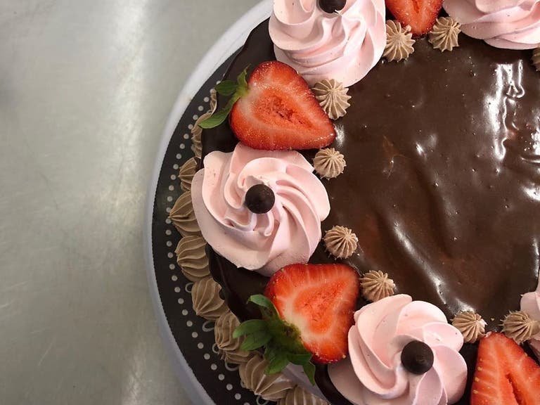 Double layer strawberry chocolate cake at Leo's Superfood Vegan Cafe 