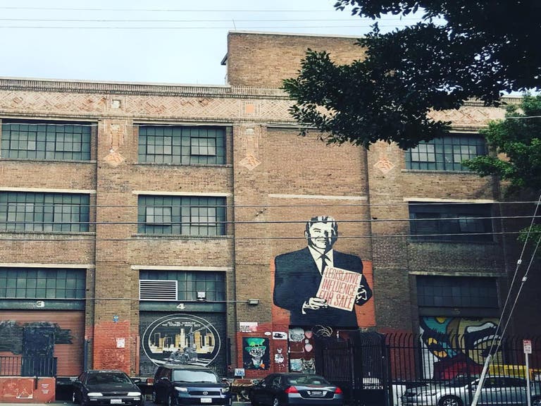 "Legislative Influence for Sale" by Shepard Fairey viewed from Alameda Street | Photo: @ladyinla, Instagram