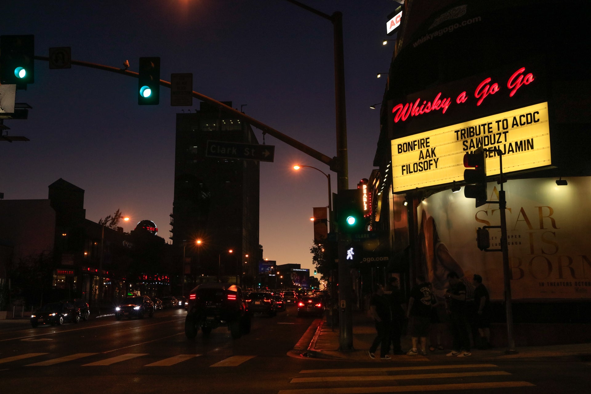 Dodger fan Sal Torres shows his tattoo outside a bar on Sunset Blvd. near  Dodgers Stadium