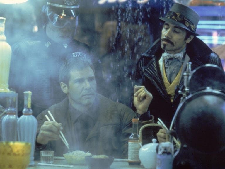 Rick Deckard and Gaff at the White Dragon Noodle Bar in Blade Runner (1982) | Photo: "Blade Runner 2049," Facebook