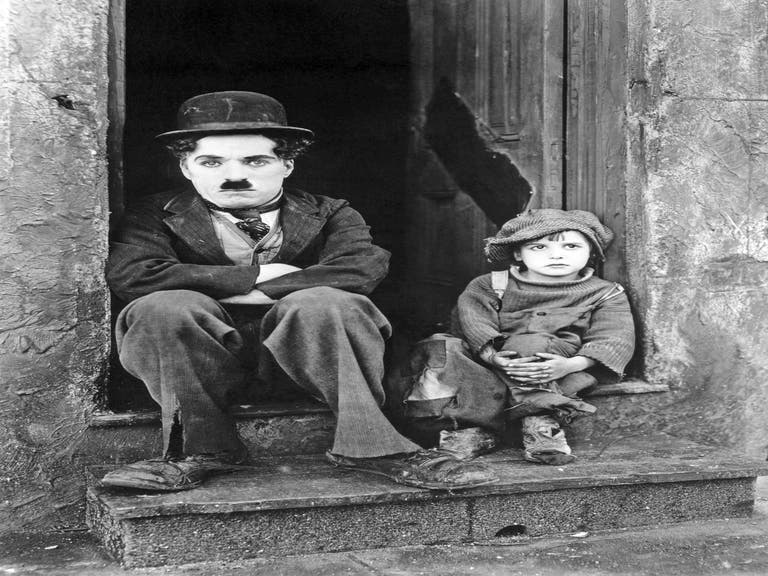 Charlie Chaplin and Jackie Coogan in "The Kid" (1921)
