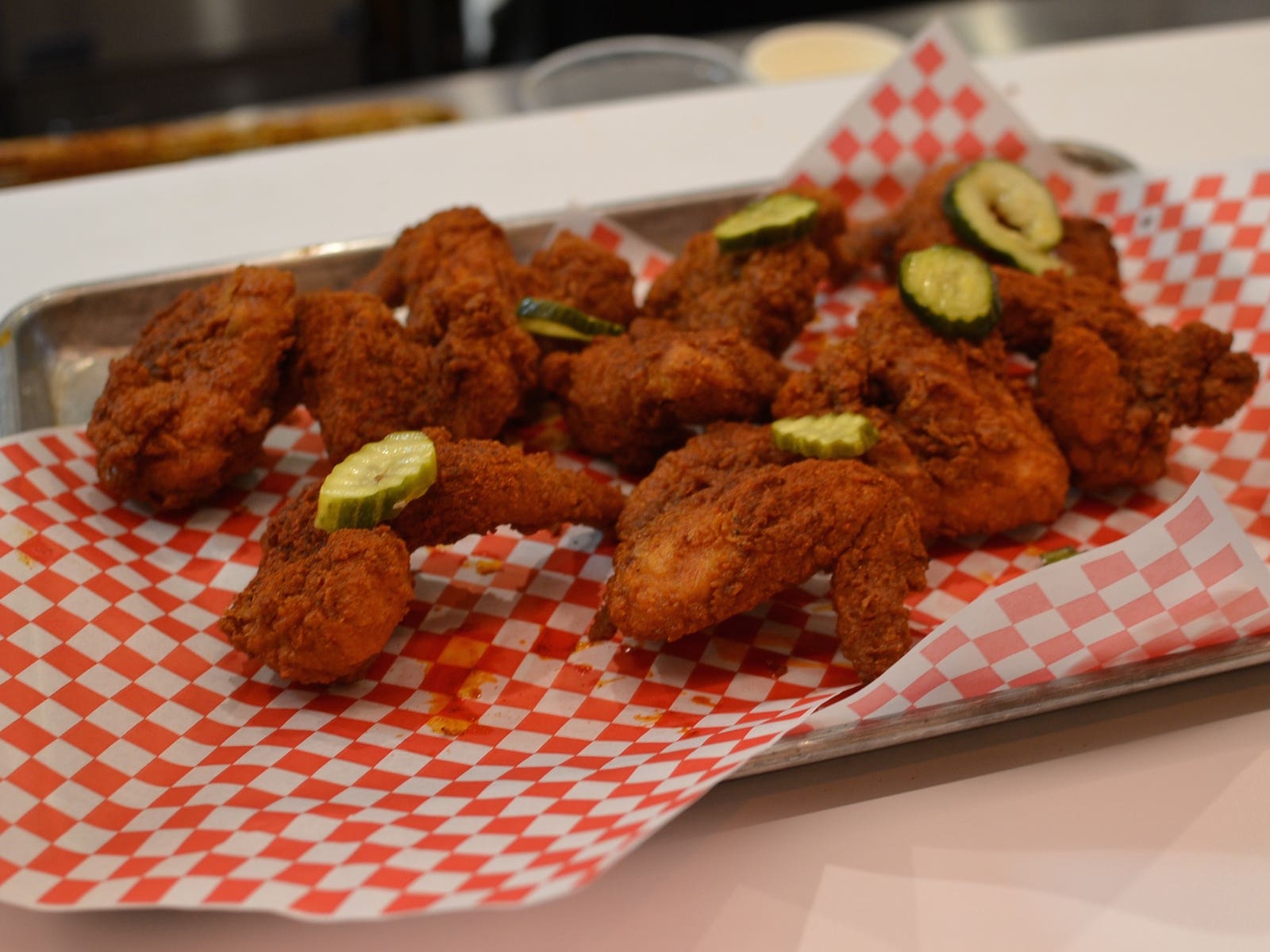Batter's Box of fried chicken wings at Howlin' Ray's