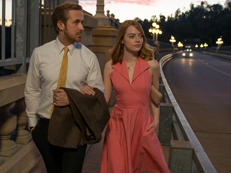 Ryan Gosling and Emma Stone stroll the Colorado Street Bridge in "La La Land"