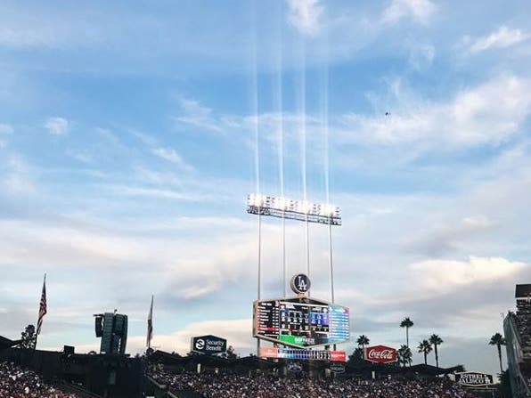 On the field at Dodger Stadium | Instagram by @wheredidlaurago