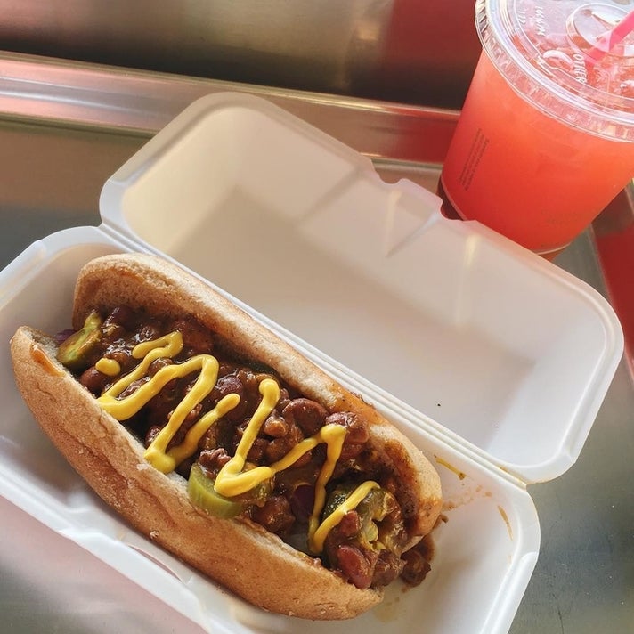 Vegan chili dog with Playas Punch at Earle's On Crenshaw | Instagram by @veganglamazon