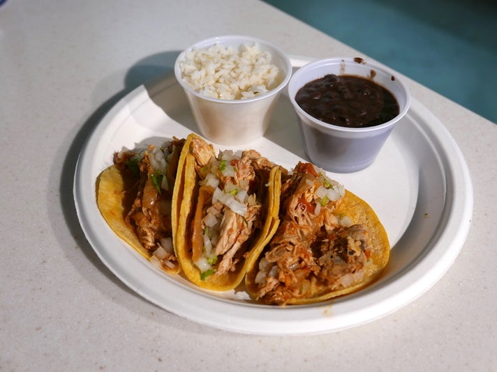 Chicken tinga three-taco platter at Loteria Grill, LAX Terminal 7