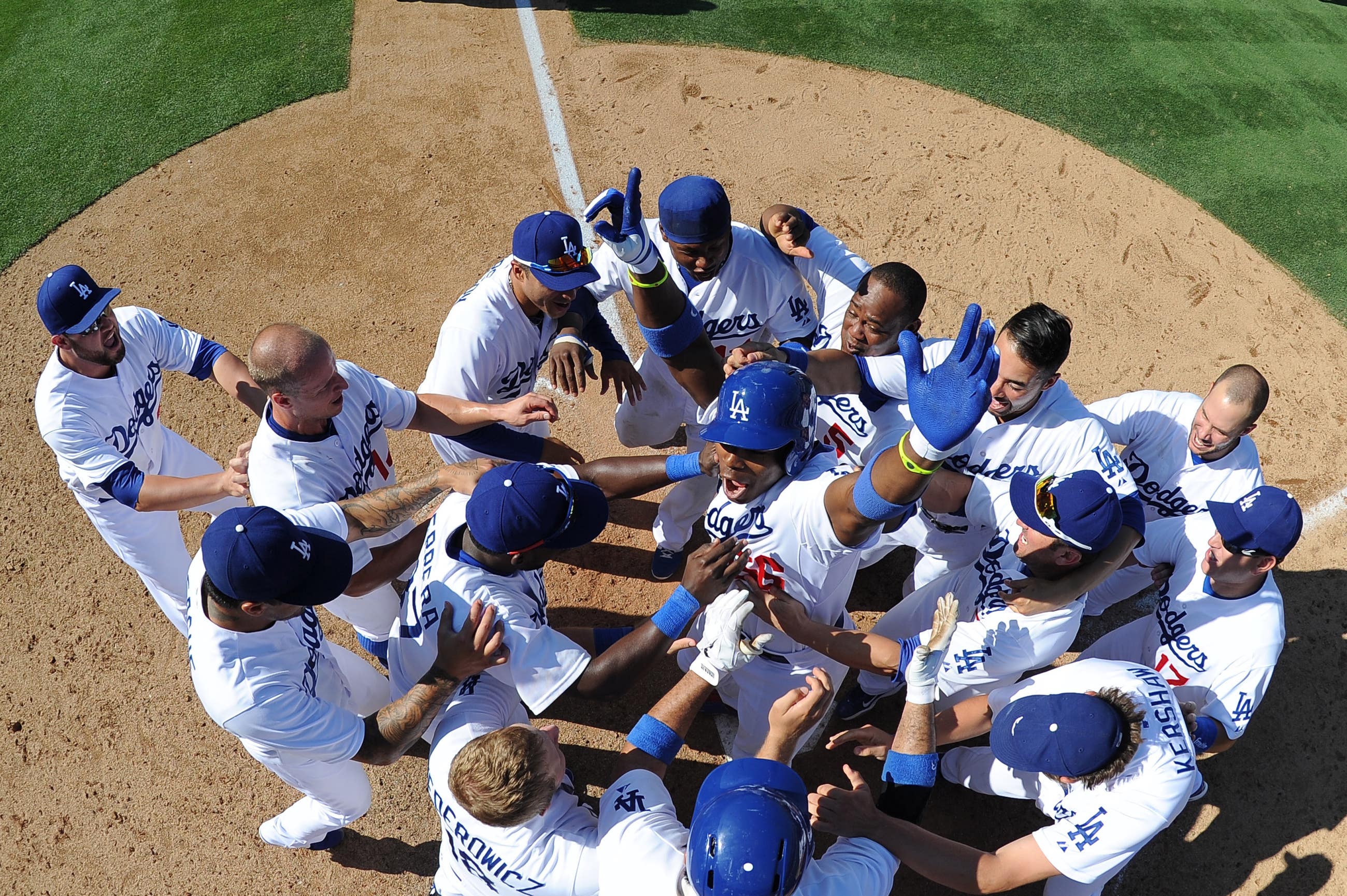 The Dodgers celebrate Yasiel Puig's walk-off home run at Dodger Stadium in 2013