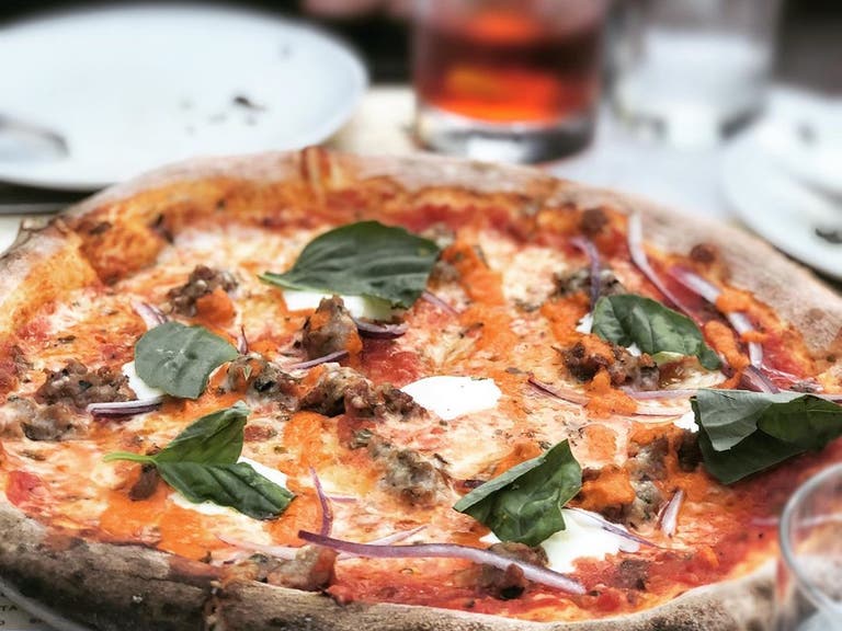  Italian Sausage pizza at Laurel Hardware | Photo: @swooningspoon, Instagram