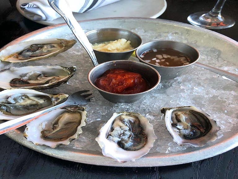$1 oysters and $5 chilled vodka shots at Pearl's Rooftop