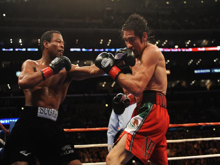"Sugar" Shane Mosely lands a punch on Antonio Margarito at STAPLES Center