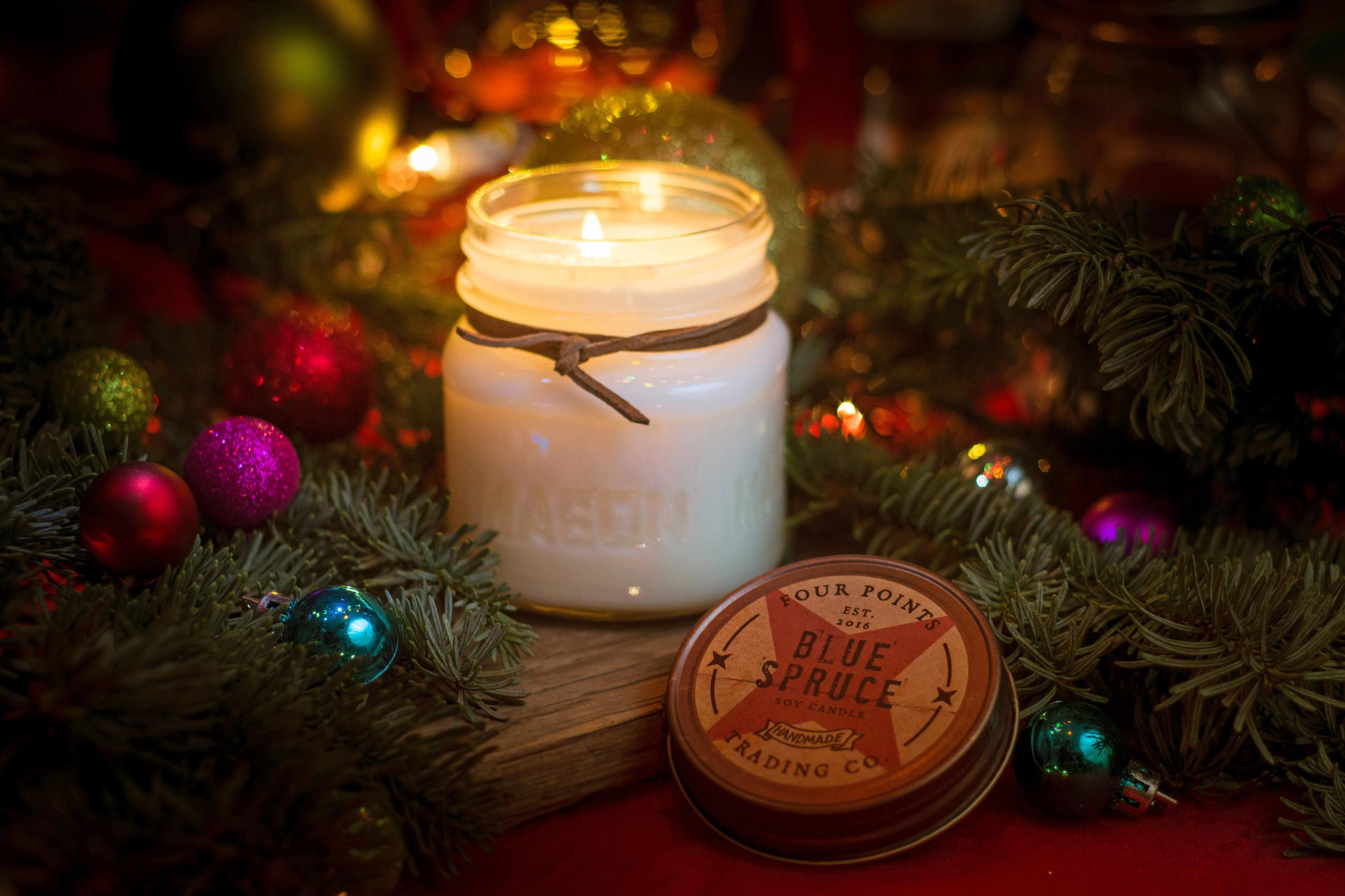 8oz Blue Spruce Holiday Candle | Photo: Four Points Trading Co.