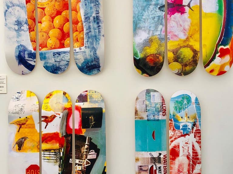 Skate decks with details from Robert Rauschenberg’s "The 1/4 Mile" at LACMA Store