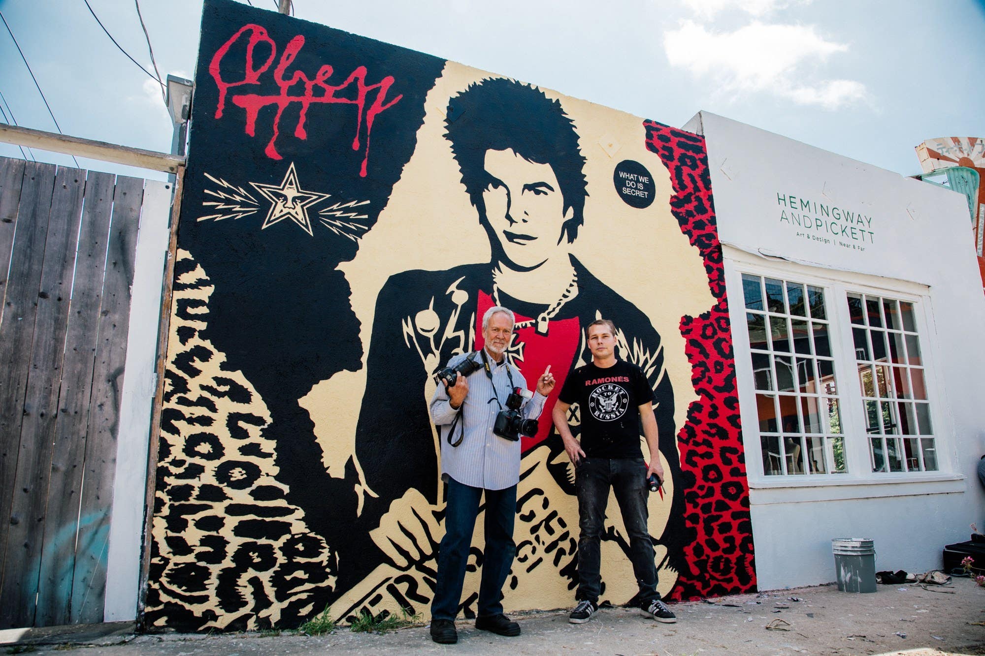 Gary Leonard and Shepard Fairey in front of the restored Darby Crash mural | Photo: Obey Giant