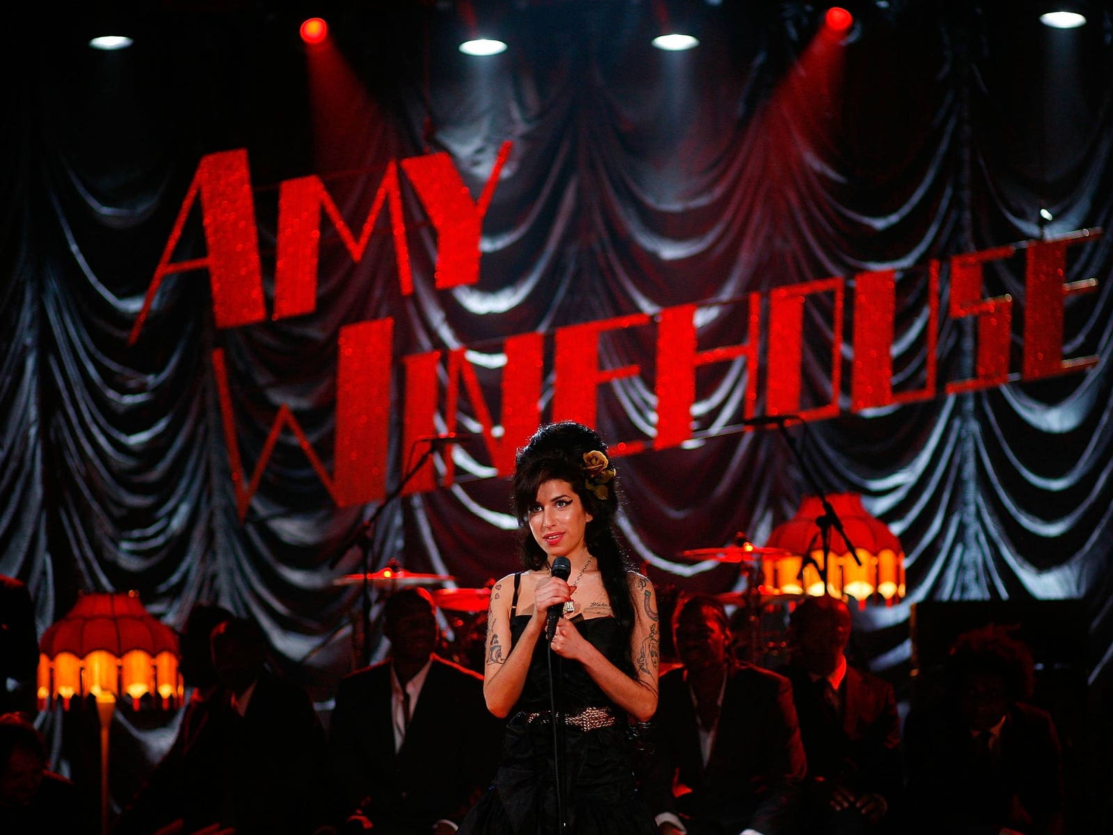Amy Winehouse performs at the 50th GRAMMY Awards live via satellite from London