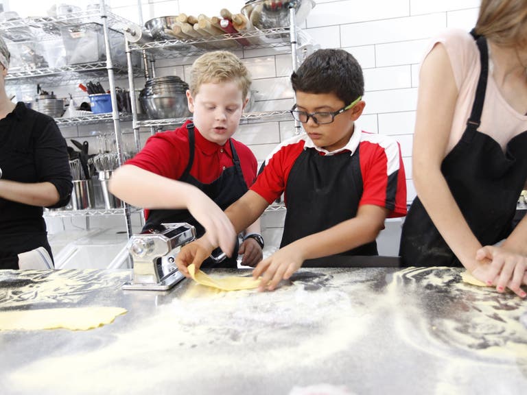Boys making pasta at The Gourmandise School in Santa Monica