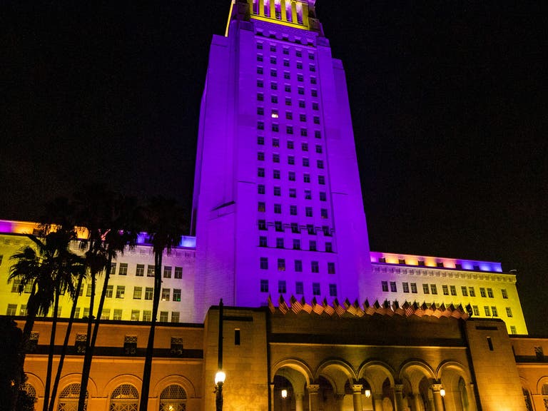 LA City Hall lit up in purple and gold in honor of Kobe Bryant