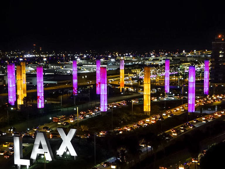 LAX Gateway Pylons are lit up in purple and gold in honor of Kobe Bryant