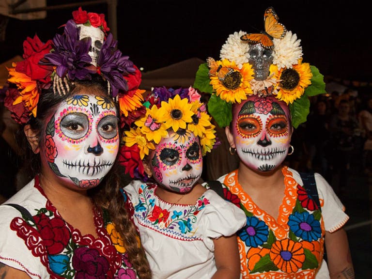 Girls in calavera makeup at the Self Help Graphics Día de los Muertos Celebration