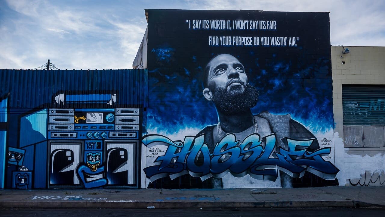 Nipsey Hussle mural by Levi Ponce at 1547 Estudillo Ave. in Boyle Heights