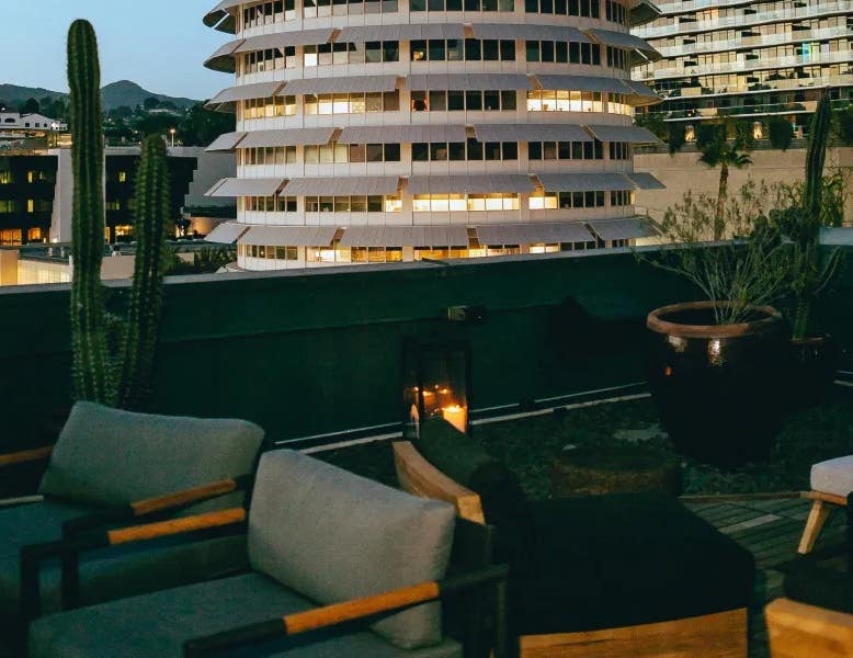 The Aster's outdoor patio overlooks the historic Capitol Records building in Hollywood.