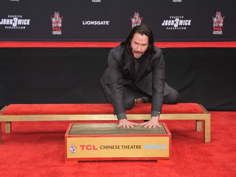 Keanu Reeves leaves his handprints in the Forecourt of the Stars at TCL Chinese Theatre IMAX