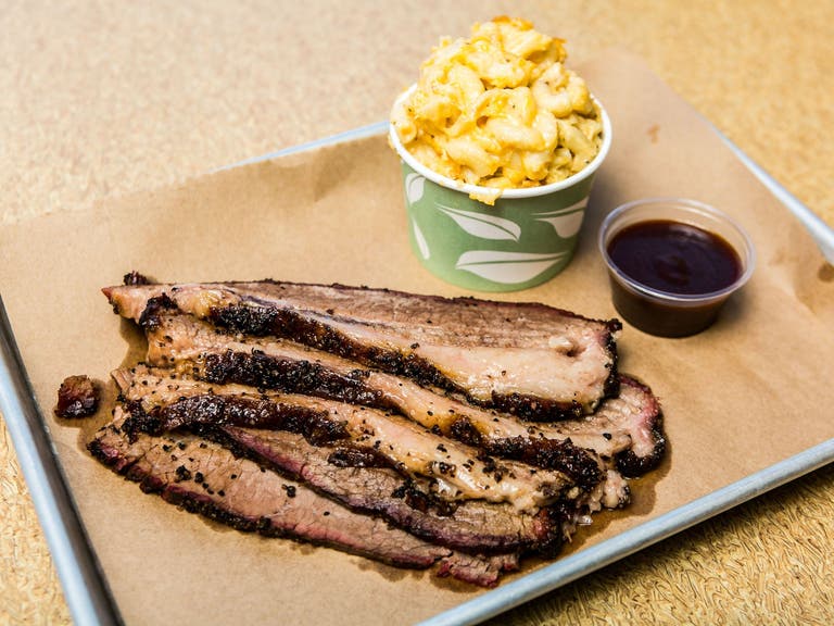 Bludso's BBQ slow-cooked brisket at The Proud Bird