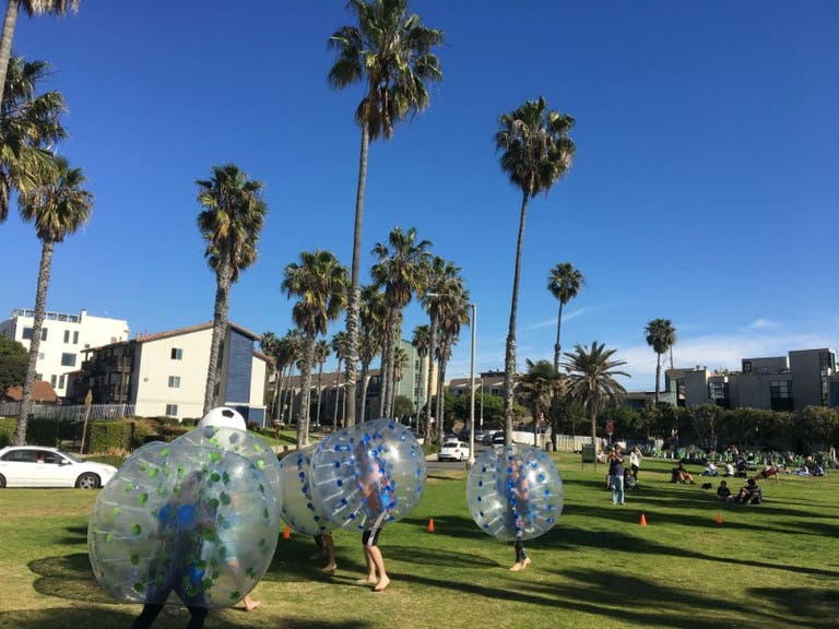 Bubble Soccer under palm trees from Airballing LA