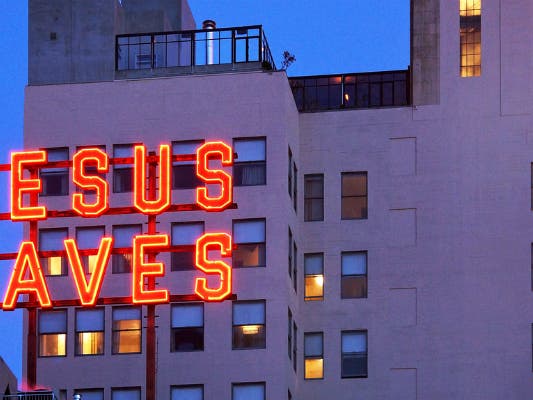 “Jesus Saves” neon sign at the Ace Hotel | Photo courtesy of Eric Lassiter, Discover Los Angeles Flickr pool