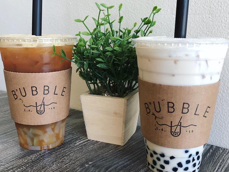 Passion Green Tea with Lychee + Oolong Milk Tea with Boba at Bubble U | Instagram by @kat.eats_
