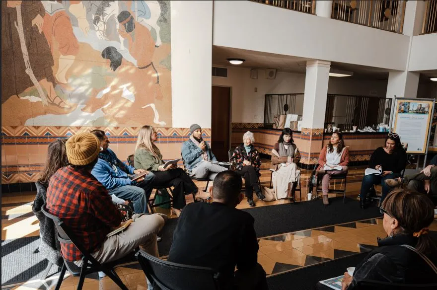 P﻿hoto by Kenneth Lopez of participants discussing the lobby mural in historic Santa Monica City Hall.