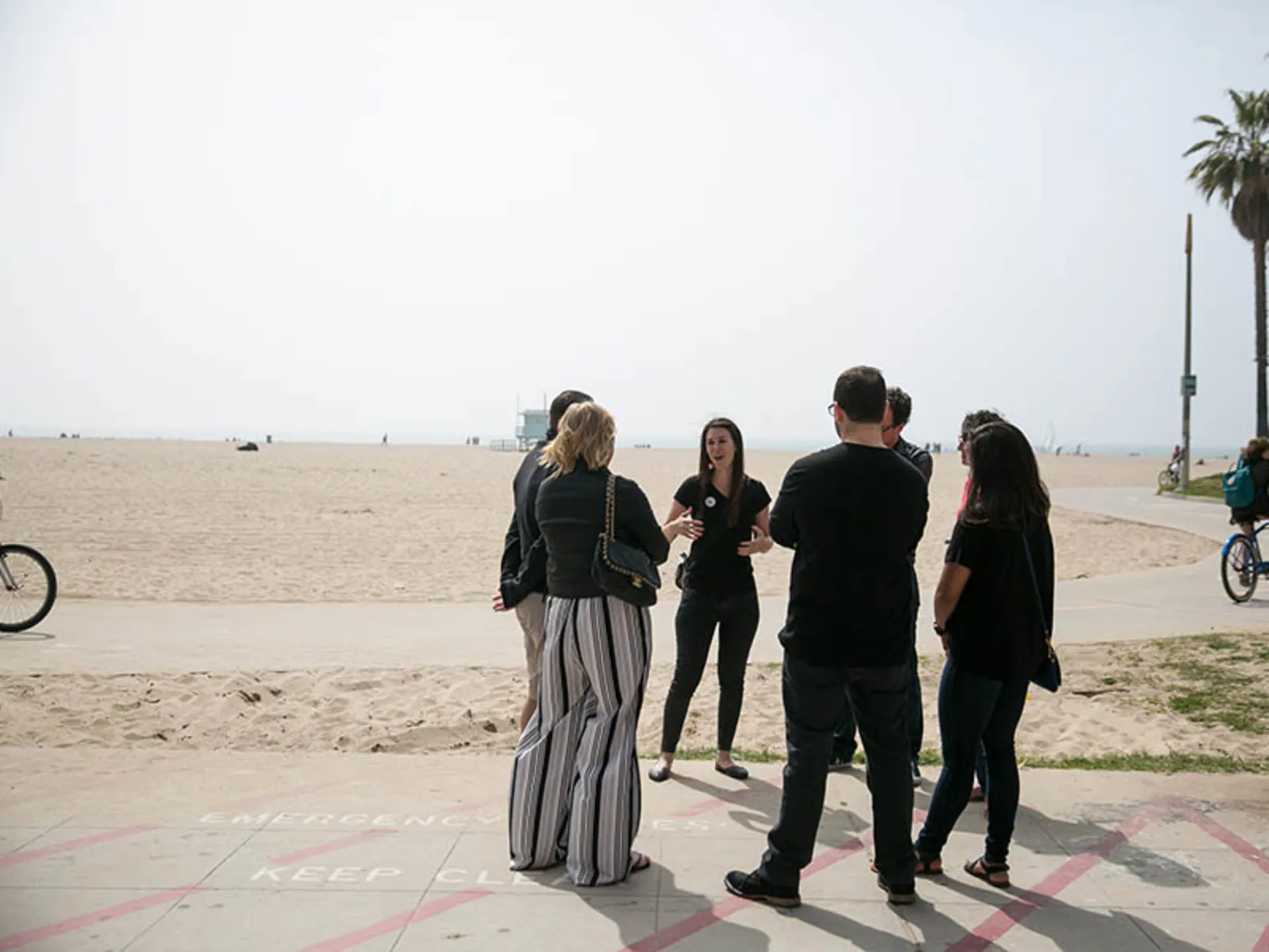 Group speaking about history of Venice on the Beach