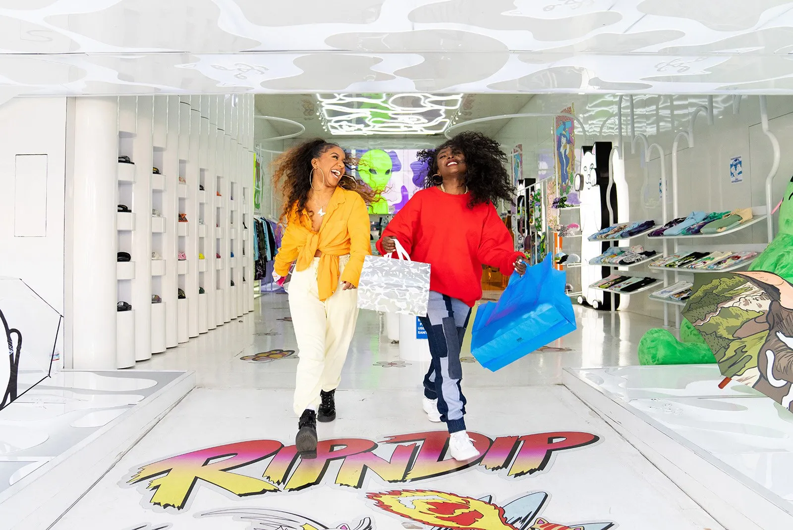 Two females shopping at Rip N Dip