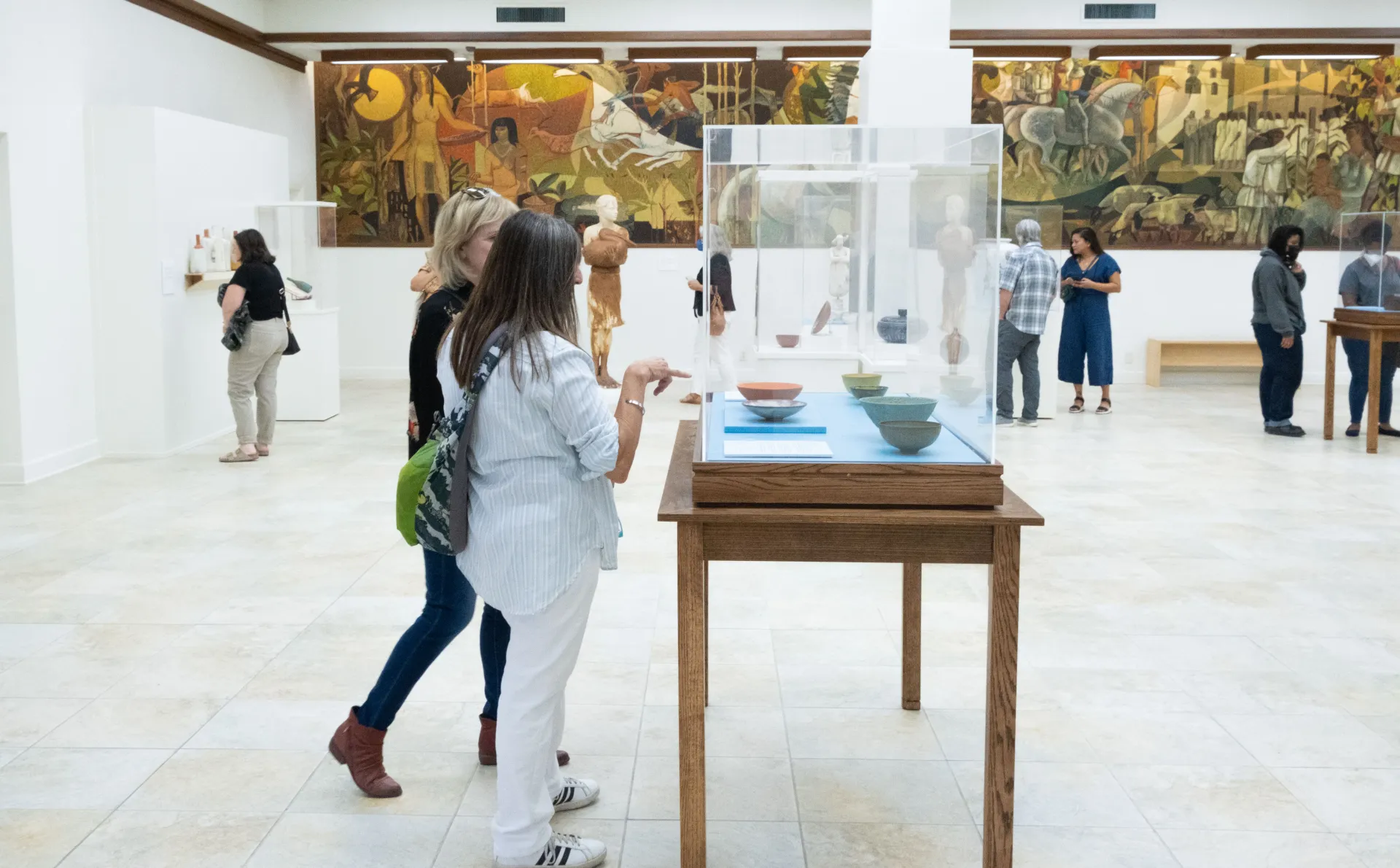 Visitors explore exhibitions at AMOCA