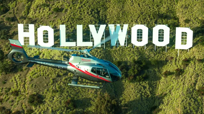 Helicopter in front of Hollywood Sign