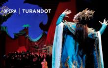 Woman in blue dress holding up bent arms. Set in the background. Text reads LA Opera Turandot.