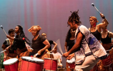 Bloco Obini drumming on stage
